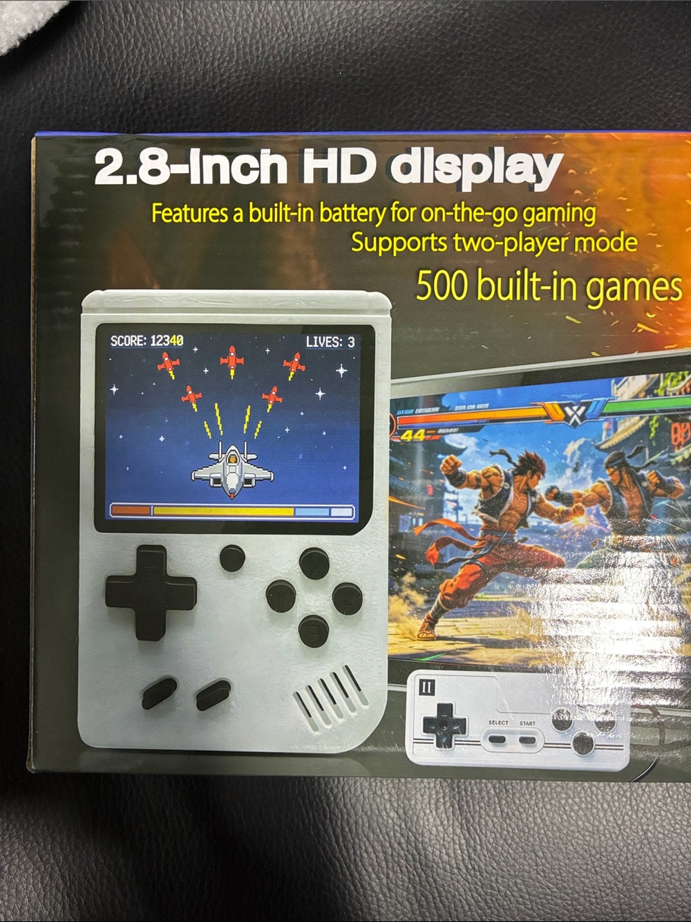 Source Unknown White Handheld Retro Gaming Console with Black Buttons
